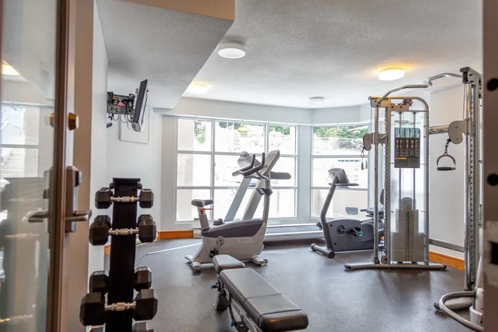 Exercise room featuring a textured ceiling