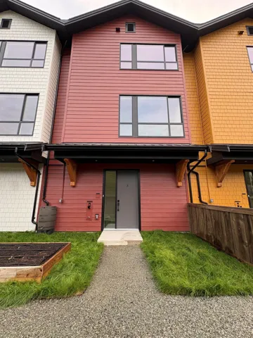 Rear view of house with a garden
