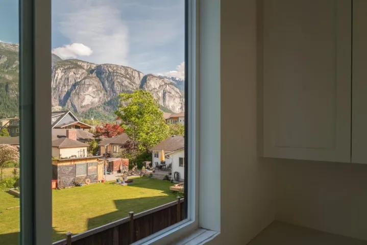 Interior space featuring a mountain view and a residential view