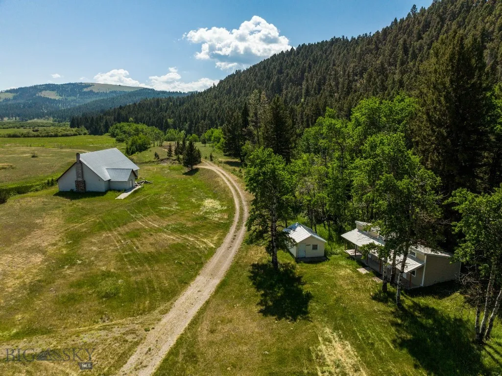 Looking east, chapel and 2 cabins