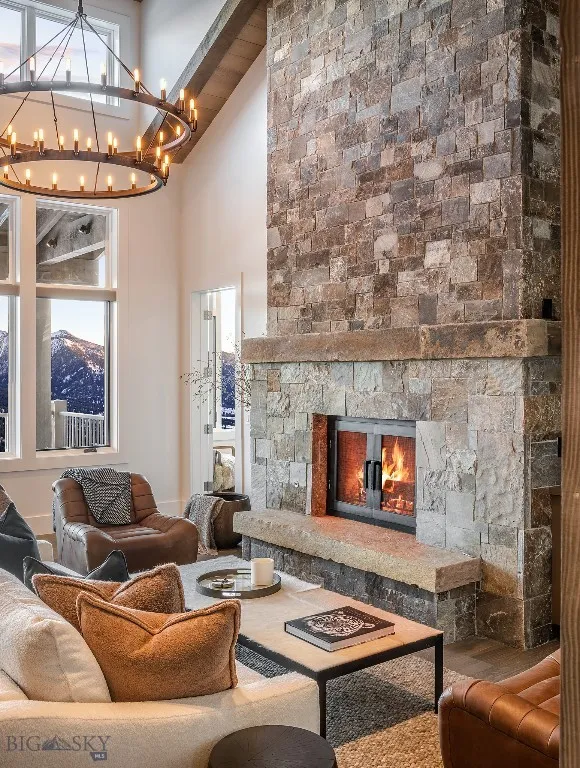 Wood burning fireplace in living room.