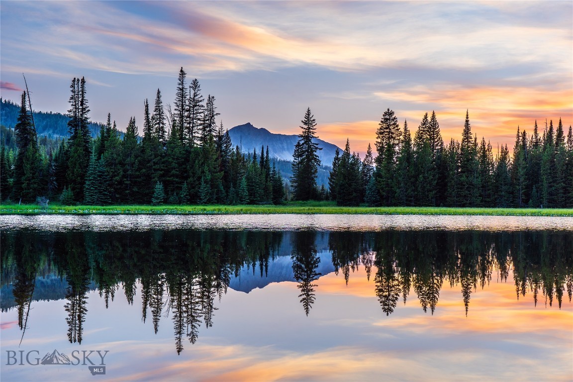 Ulery's Lake Sunsets are steps away from this stunnning residence.