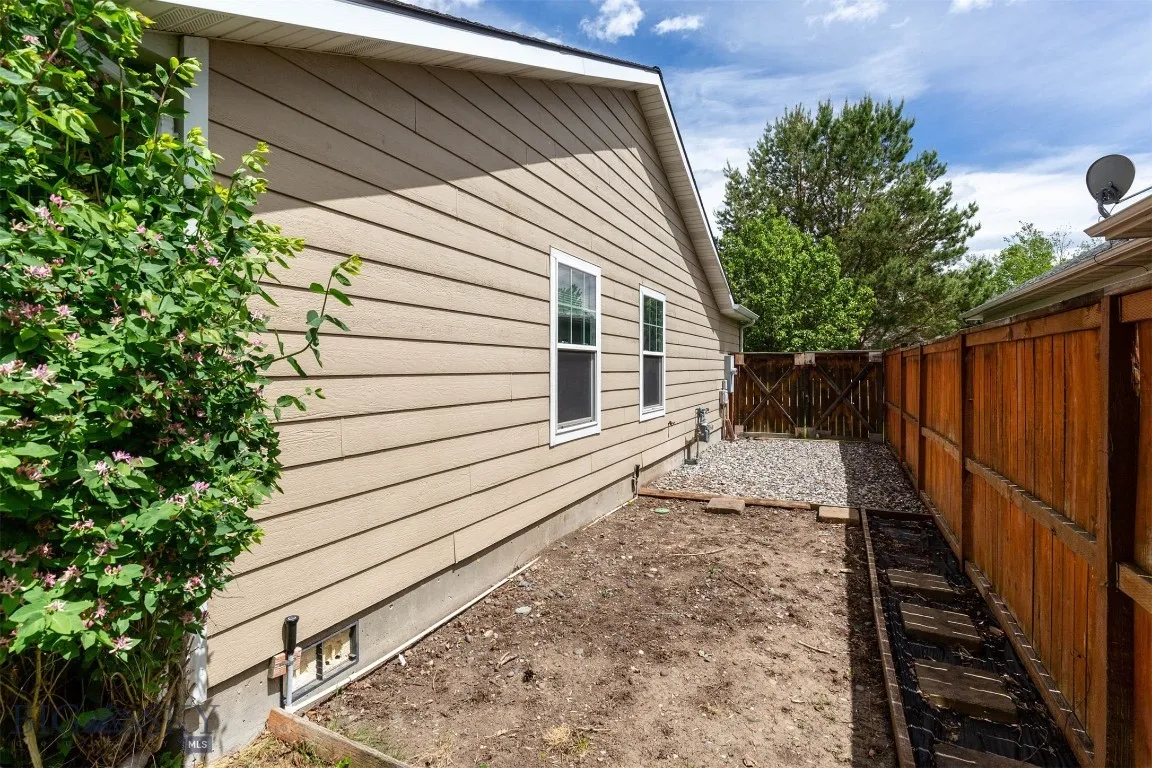 Garden area and boat storage space with accessible fenced yard entry