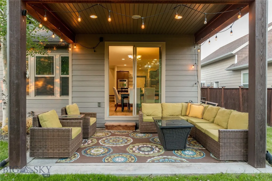 Covered back patio just off kitchen and dining area.