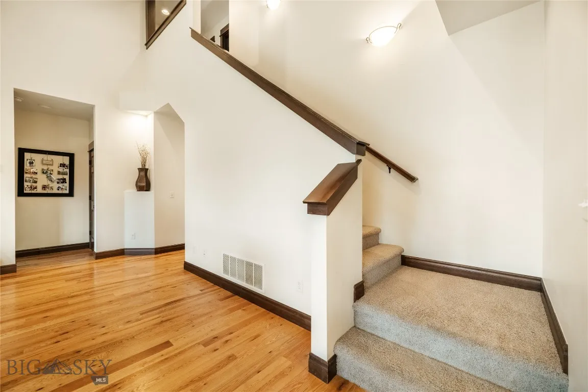 Stairs leading to two bedrooms, full bath and bonus room