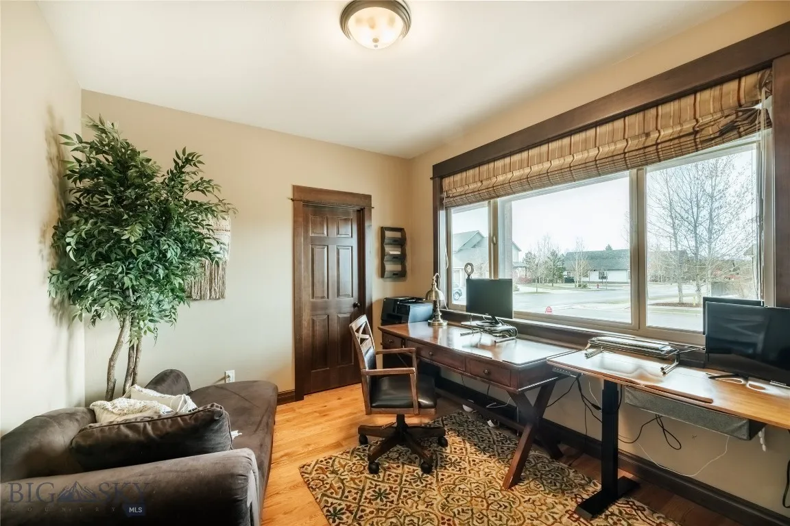 Front office or 5th bedroom with french doors - staged