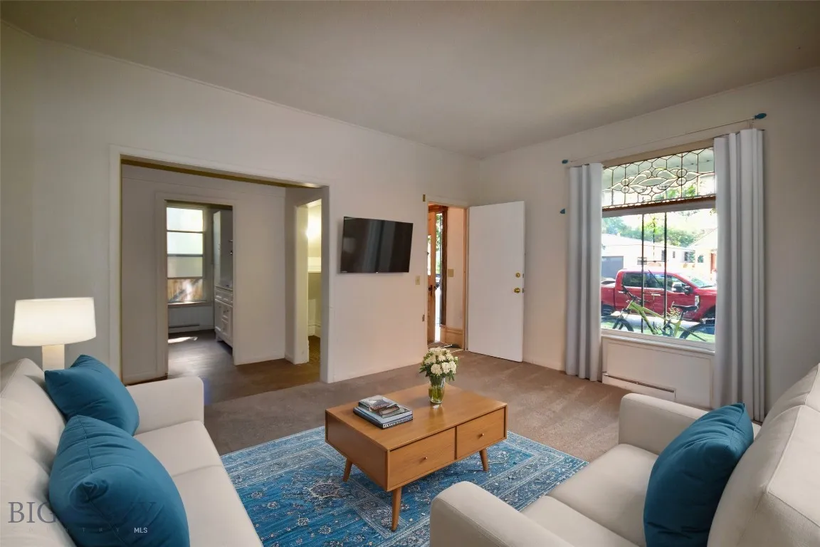 Virtually staged upstairs living room.