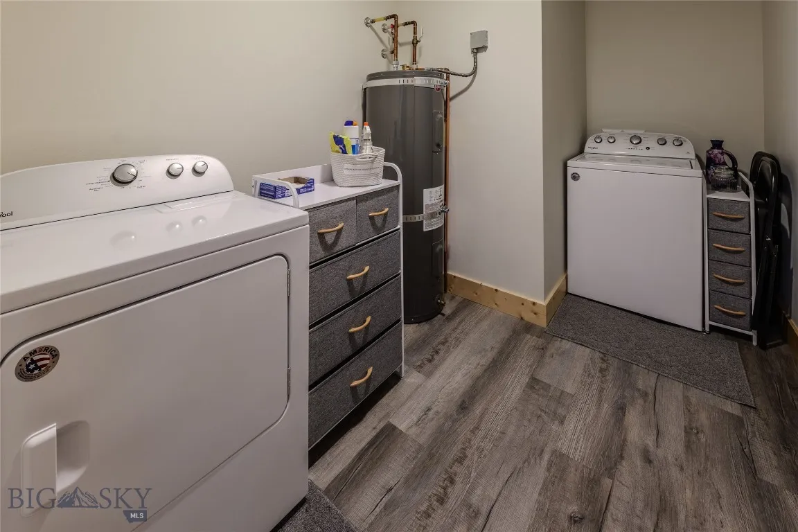 Separate laundry room with washer and dryer in each unit.