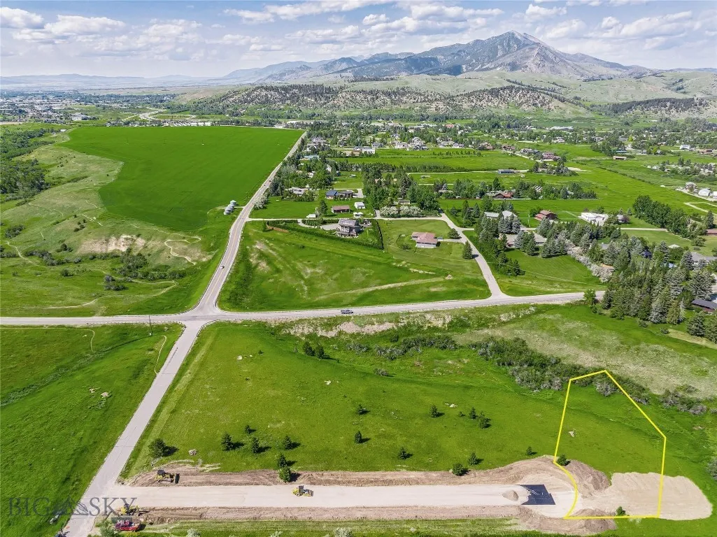 Birds eye view of property featuring a mountain view and a rural view