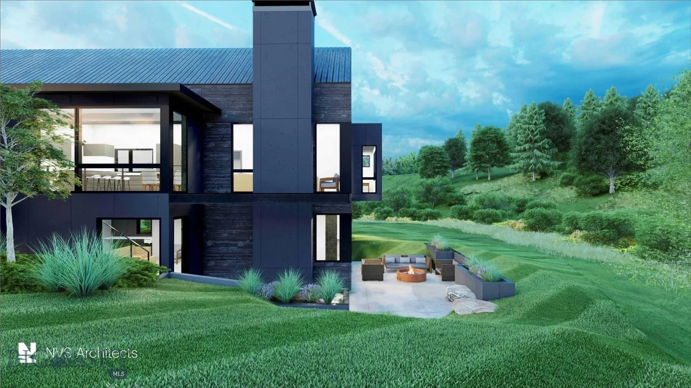 Back of house with a lawn, an outdoor living space, and a patio