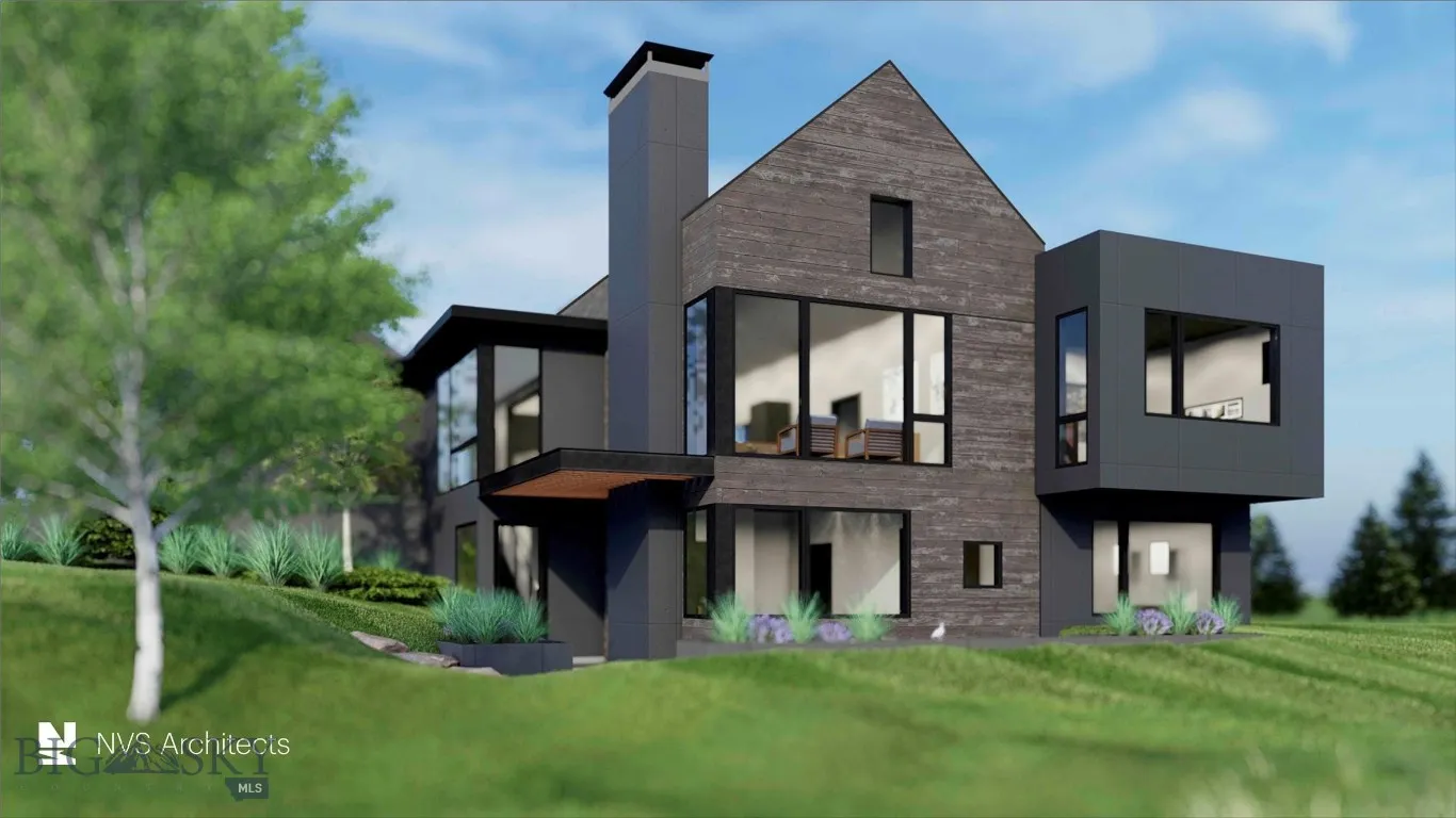 Rear view of property featuring a lawn