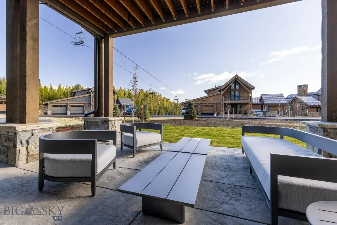 View of patio / terrace with a garage