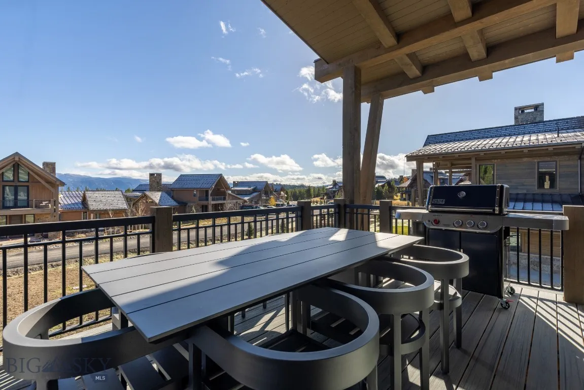 Wooden terrace with a grill