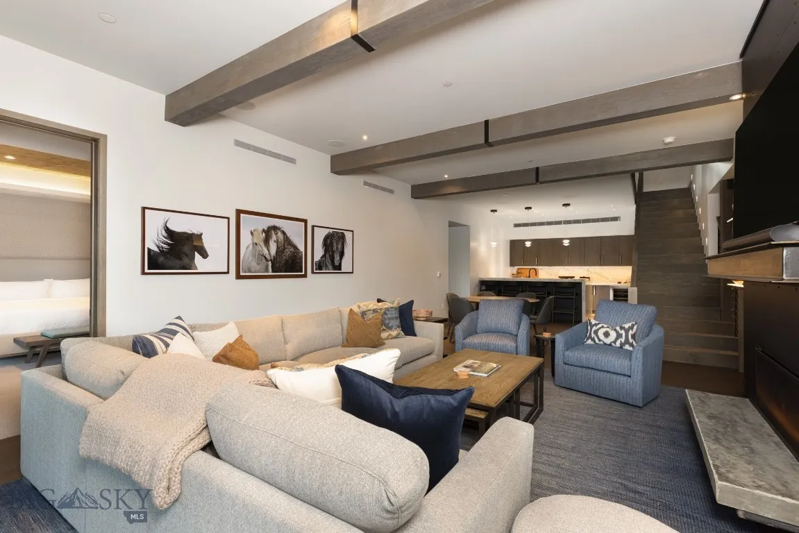 Living room with beam ceiling
