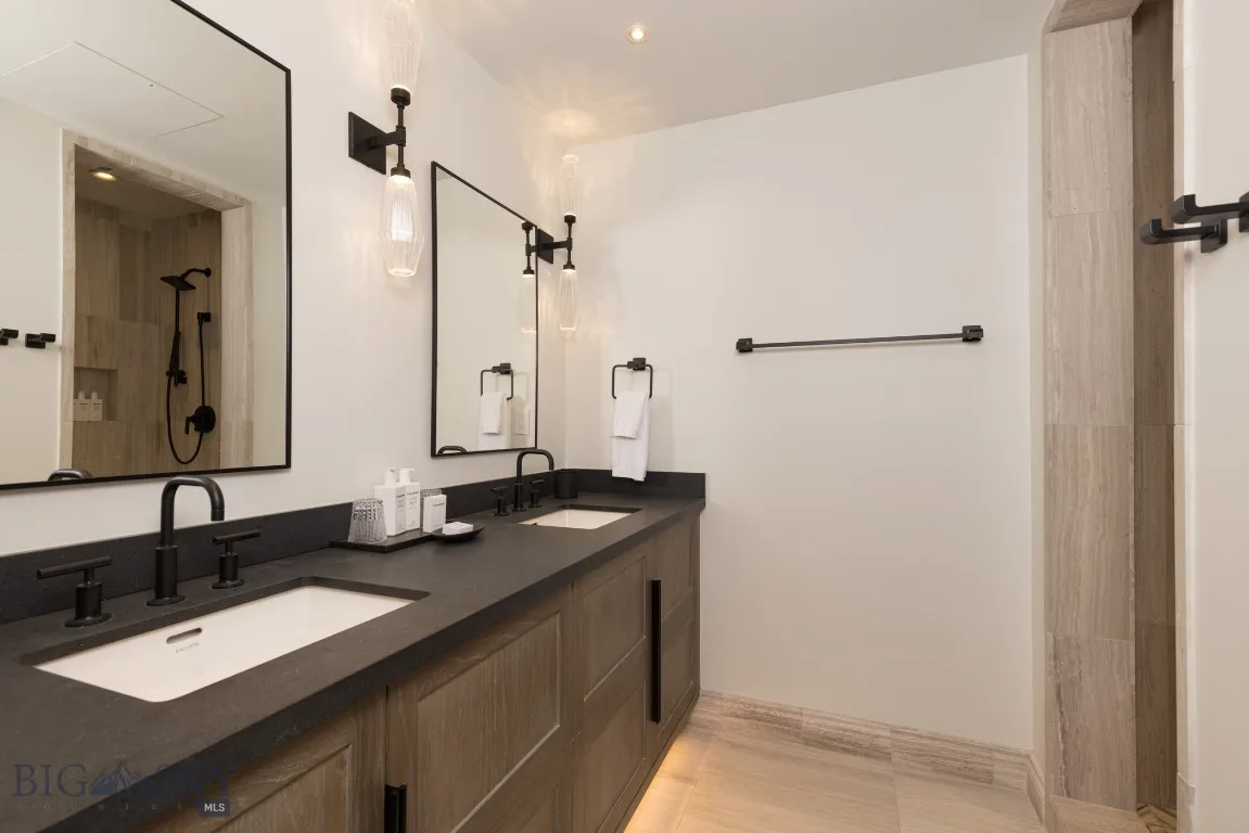 Bathroom with vanity and walk in shower