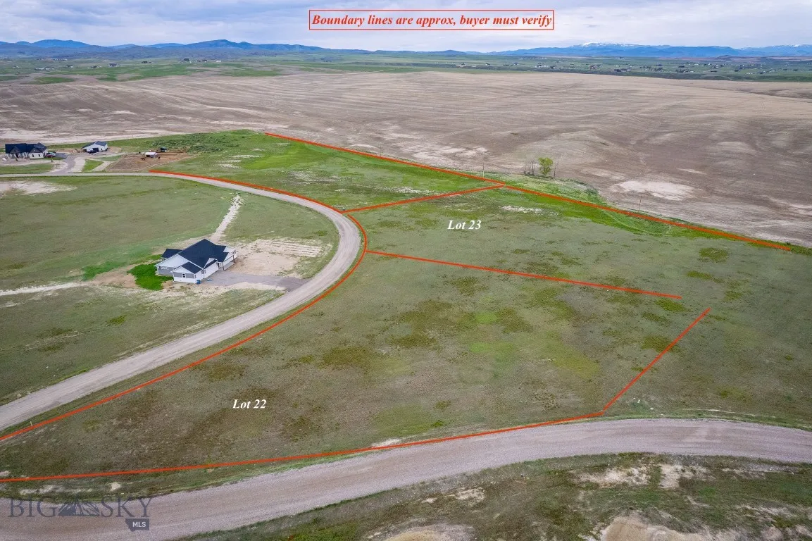 Drone / aerial view with a mountain view and a rural view