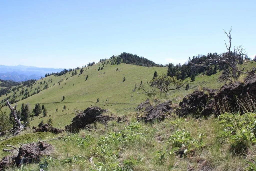 View of mountain feature with a rural view