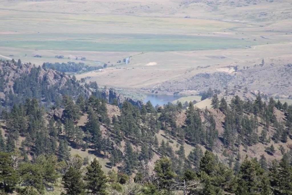 Mountain view featuring a water view