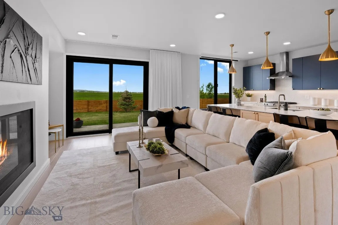 Open floor plan on the main floor with sliding glass doors to spacious backyard.