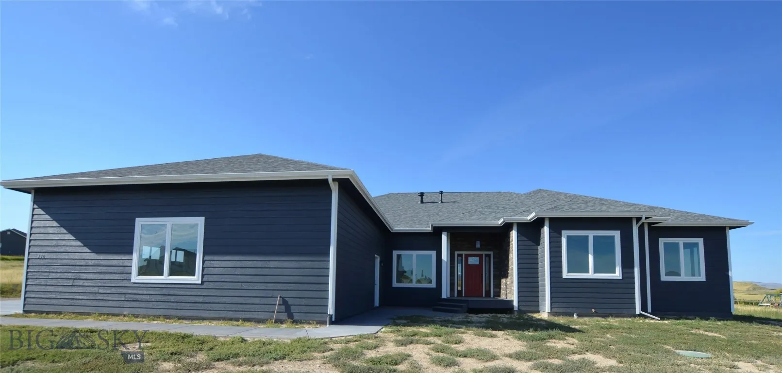 Side of garage front of house