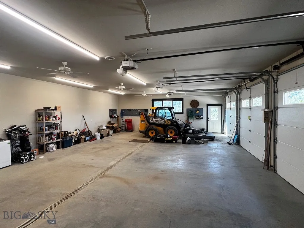 3 car garage with heated floor and HRV