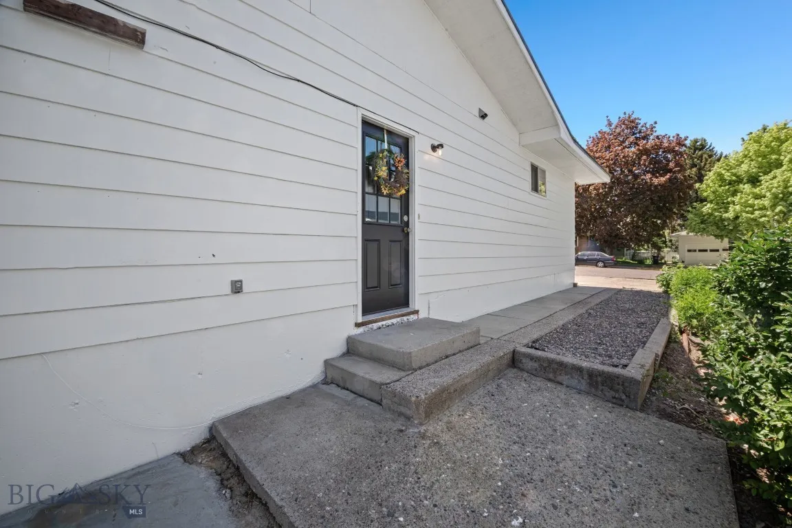 Side entrance to basement unit, upstairs (main level unit) + basement office