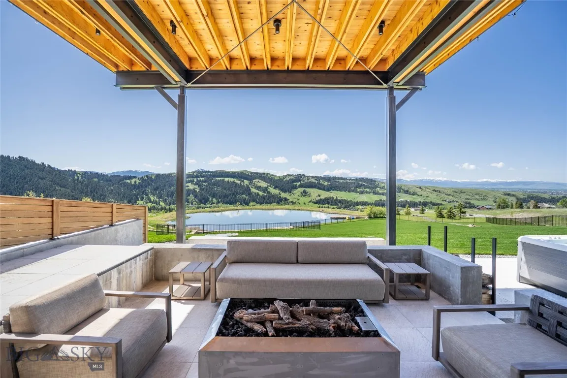 Sunken sitting area with gas firepit and radiant heated floor