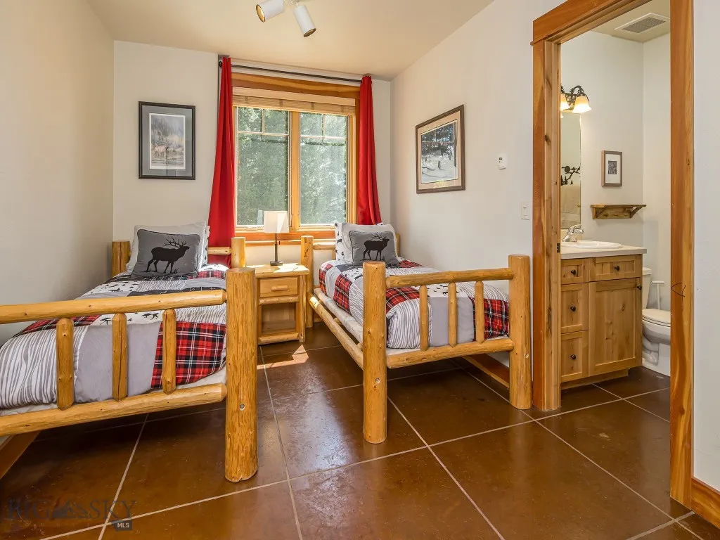 Lower level bedroom #2 with ensuite bath