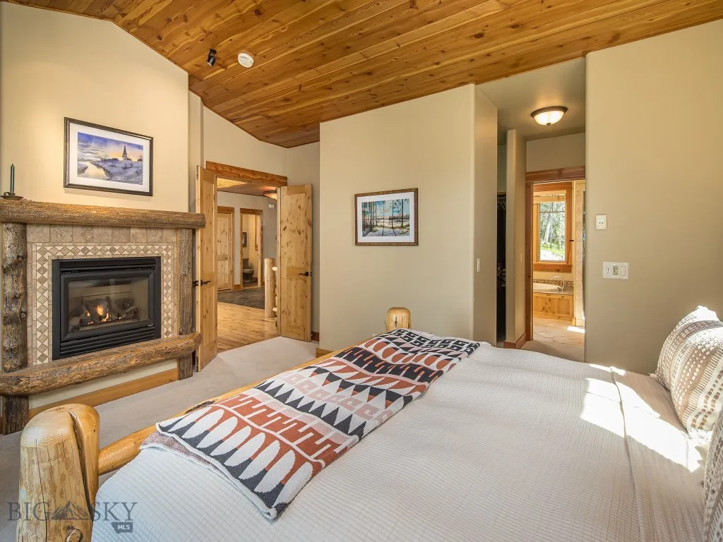 Primary suite - main floor with propane fireplace