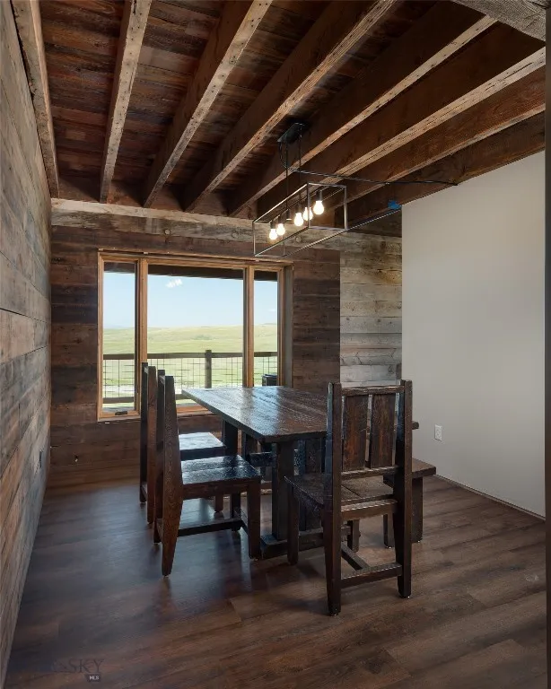 Dining room with beautiful, reclaimed lumber and unobstructed view over the State land