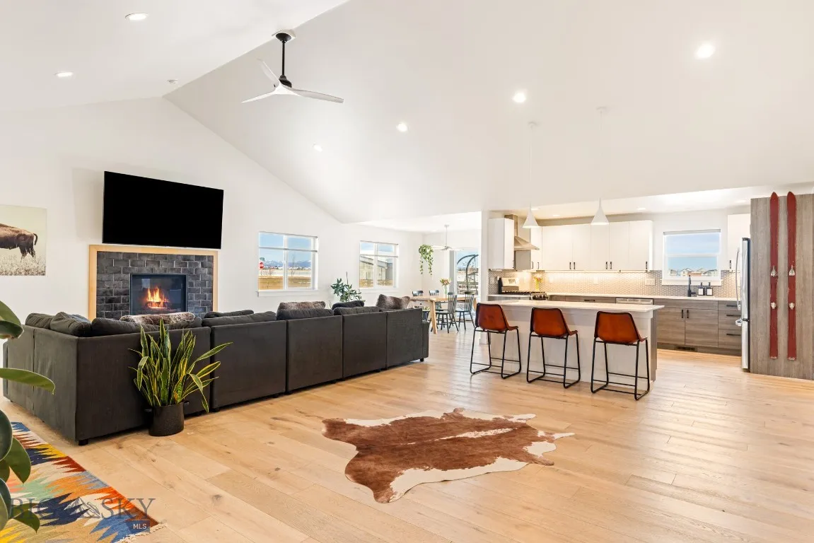 Welcome to the heart of this home. The kitchen flows to the living area, as well as the dining room, which heads out back to the back yard