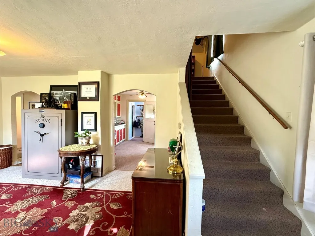 Living Room & Stairs To Upper Level