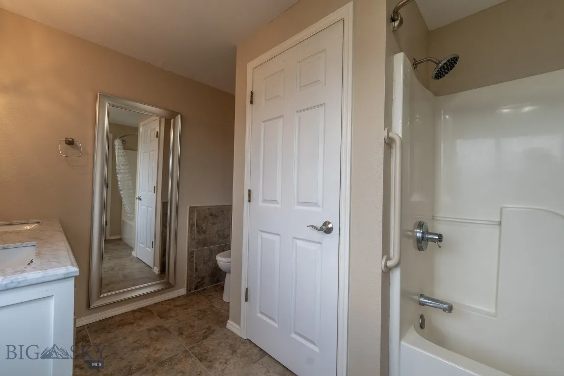 Main level, en suite bathroom to the primary bedroom