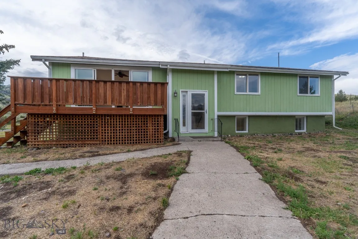 Split-level with two distinct living areas on the main floor and below grade