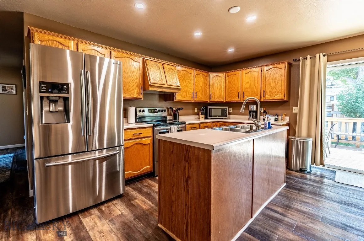Kitchen with Island and Stainless Appliances