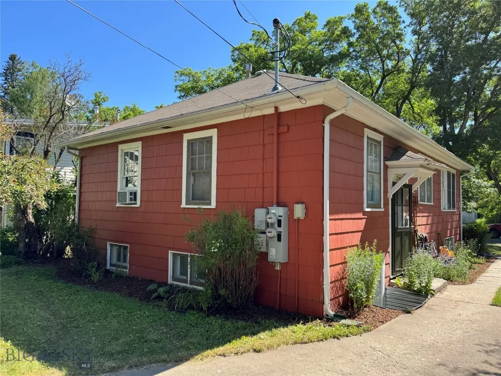 back of house with separate entrance for basement