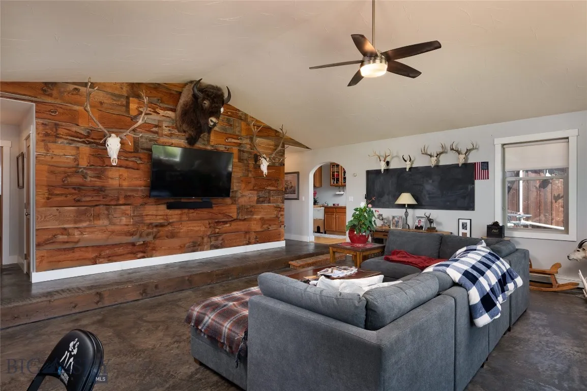 Big Media room with stamped concrete flooring