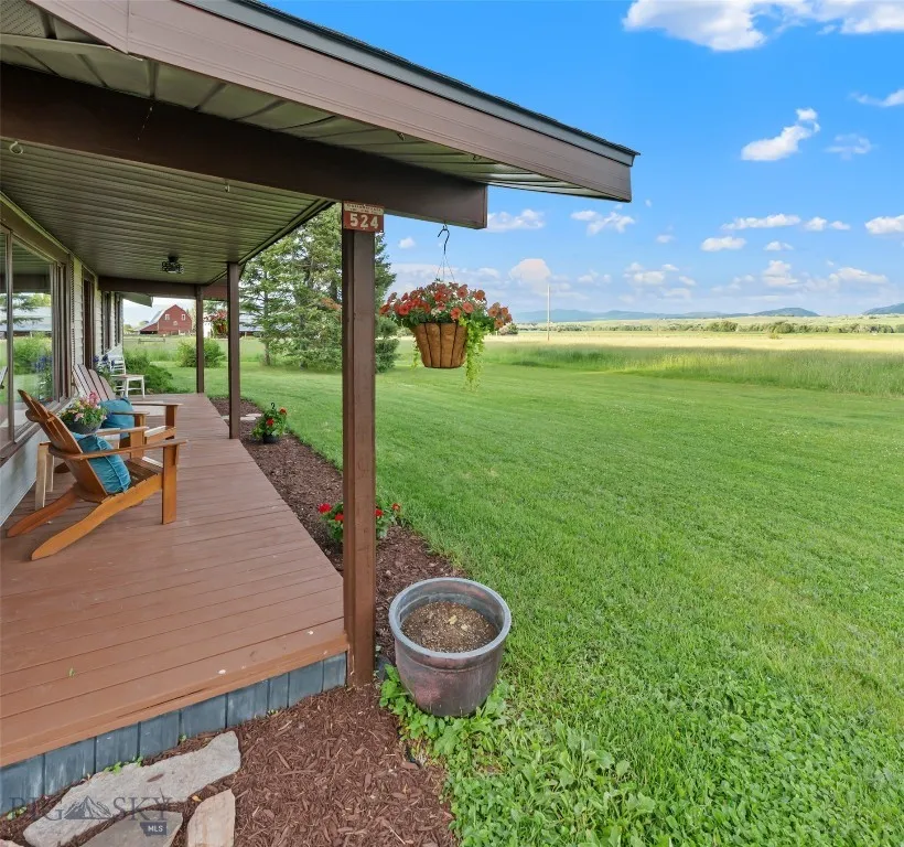 Wonderful covered front porch looking east to Abigail Ranch