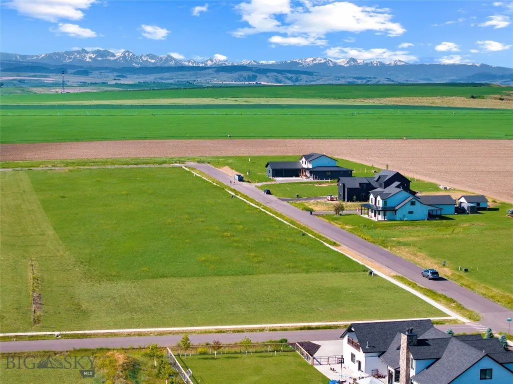 Looking south - surrounded by open rural farmland, Spanish Peak Mountains (Big Sky) in the distance.