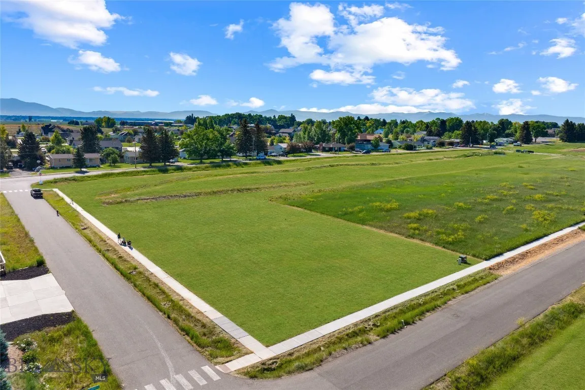 This lot sits at the corner of Guffman and Cushing. Adjacent to open HOA maintained park space.