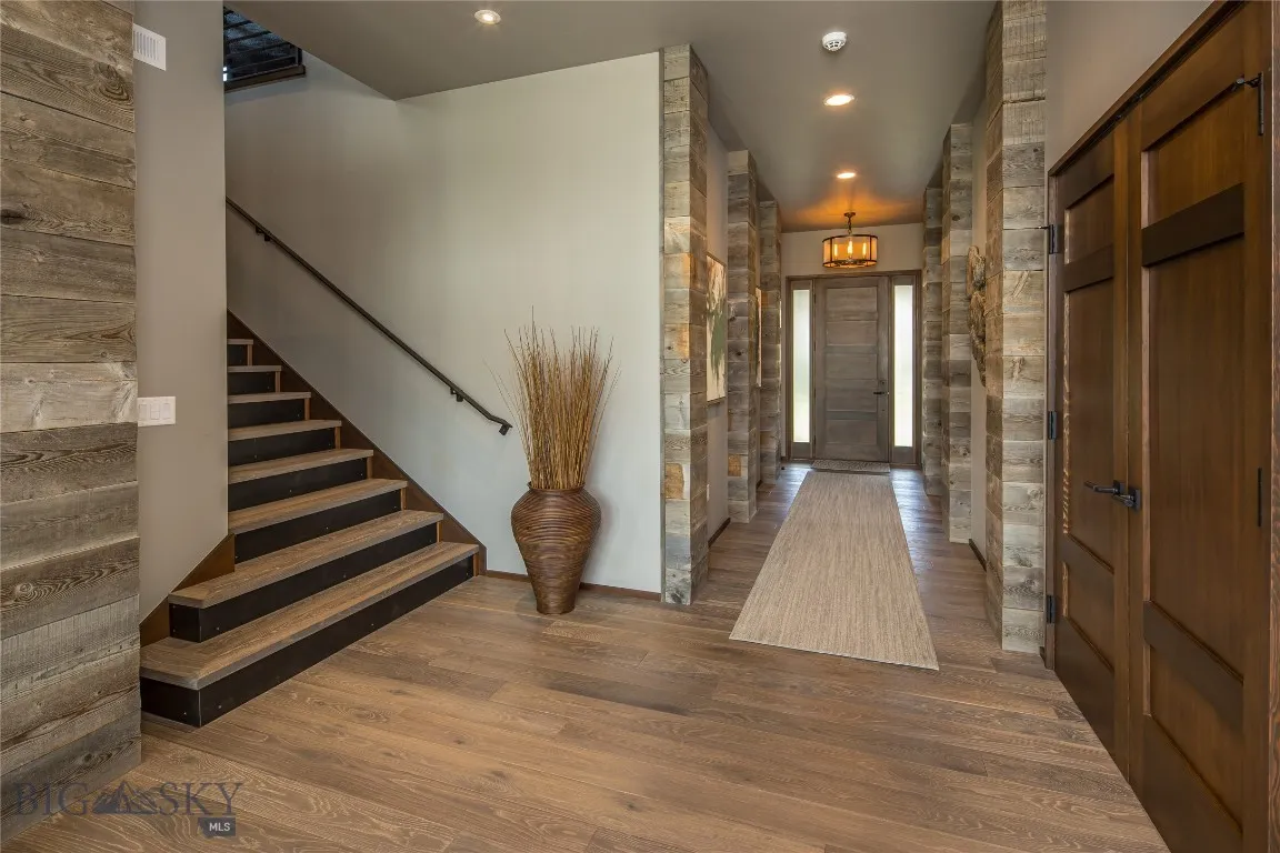 Main level entry and staircase to upper level.