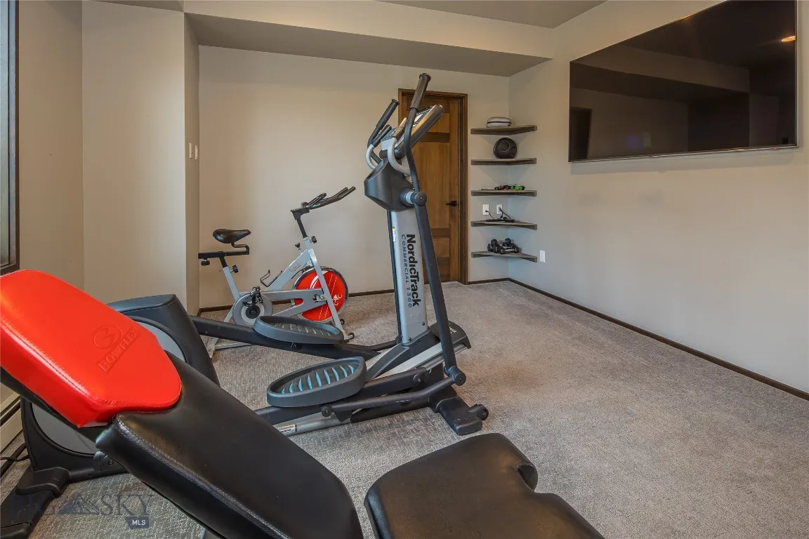 Upper level bedroom, designed as a workout room.