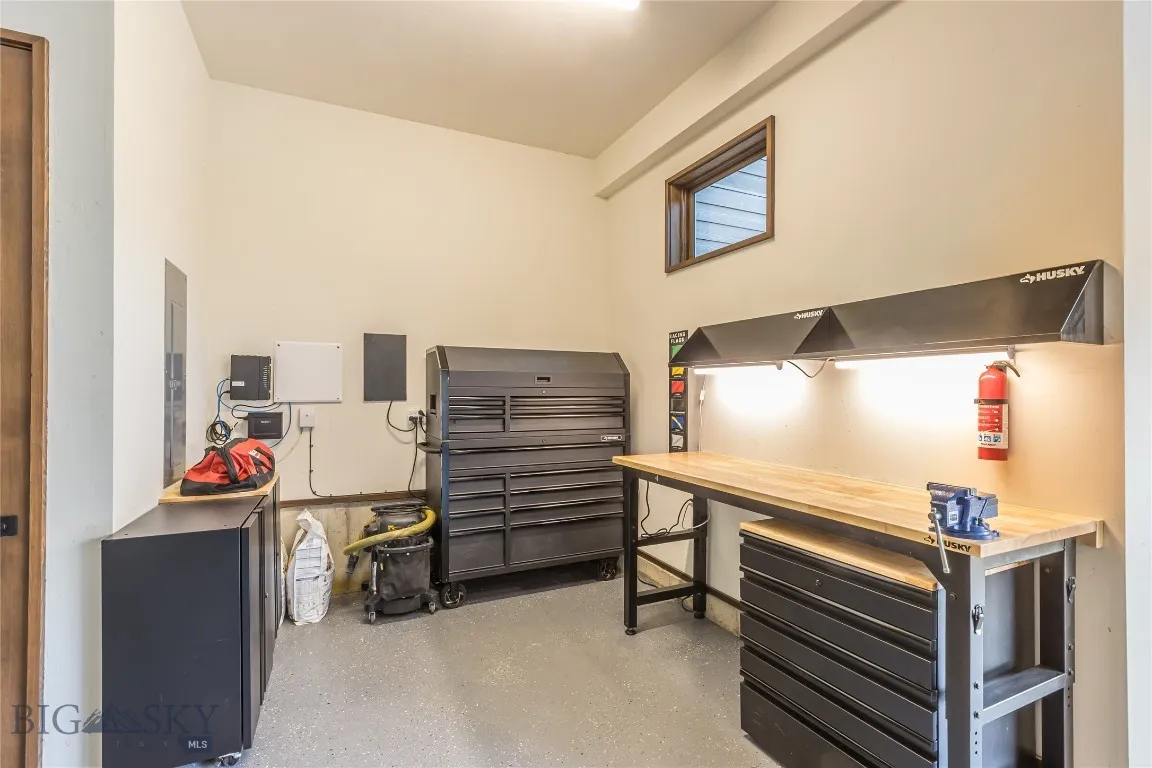 Garage acces with shop area