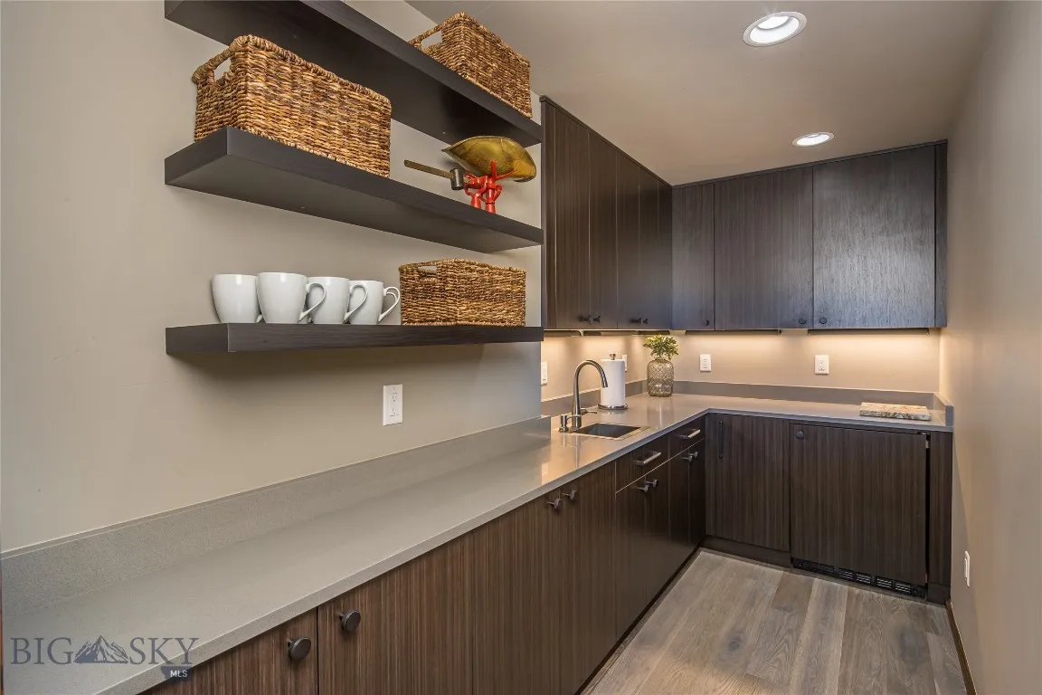 Walk in pantry with wet bar.