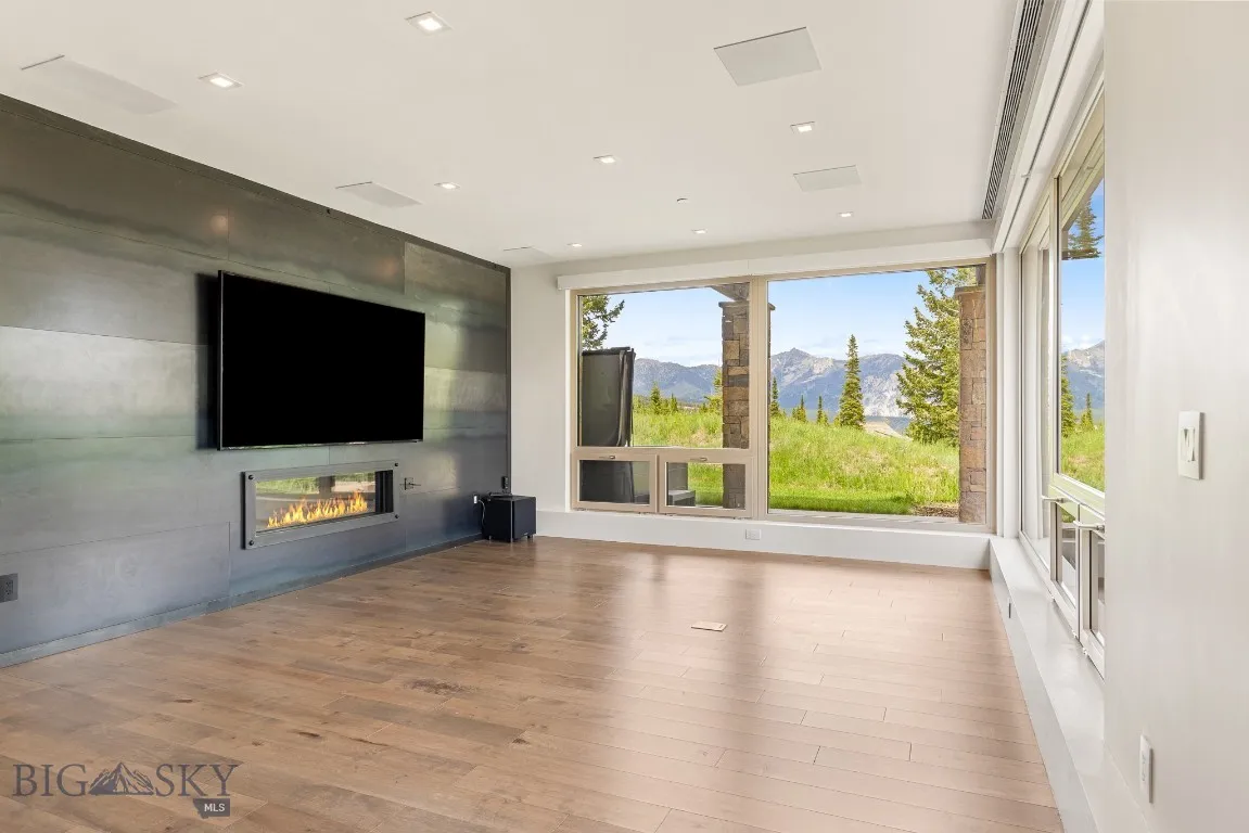 Lower level family room with gas fireplace