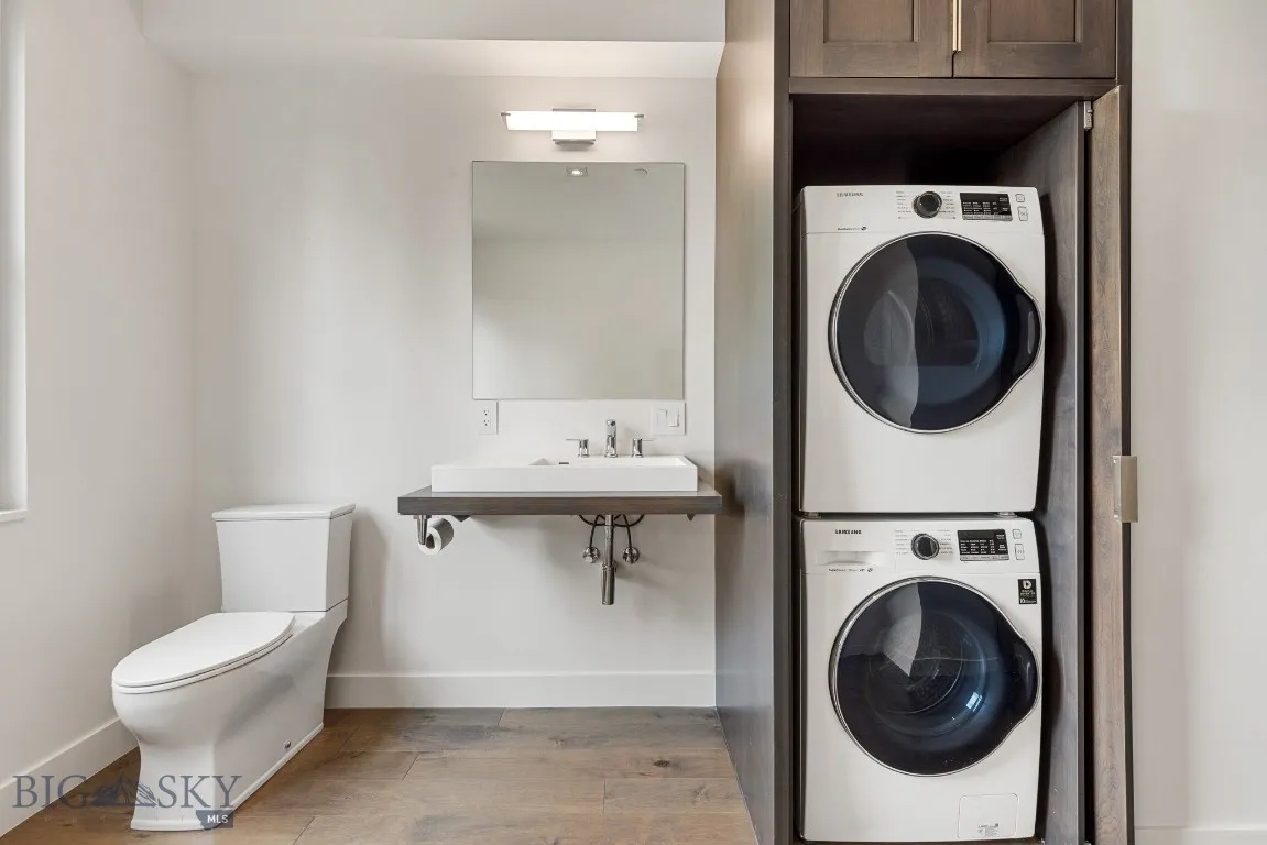 Main level Laundry/Powder Room. There is a large dedicated laundry room on the lower level.