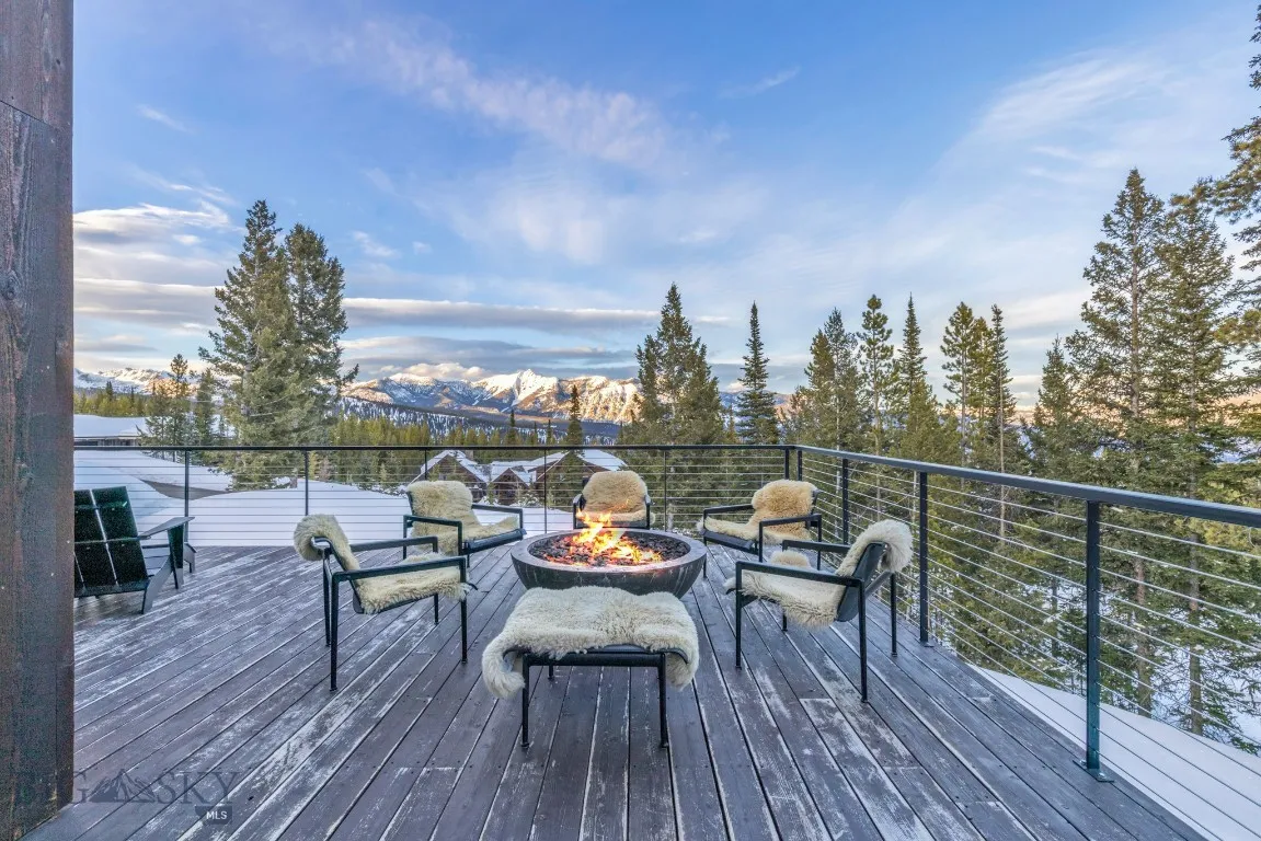 Winter shot of gas fire pit on main level deck