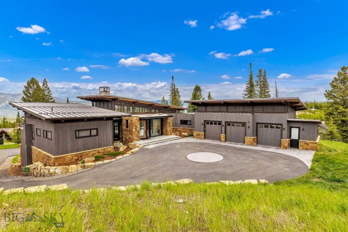 The 3 car garage has a dedicated ski room to the right!