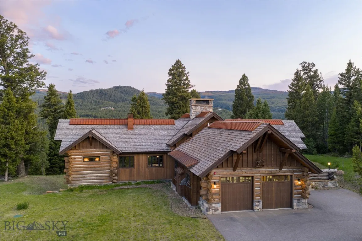 Experience the ultimate in mountain living with this beautifully crafted log home