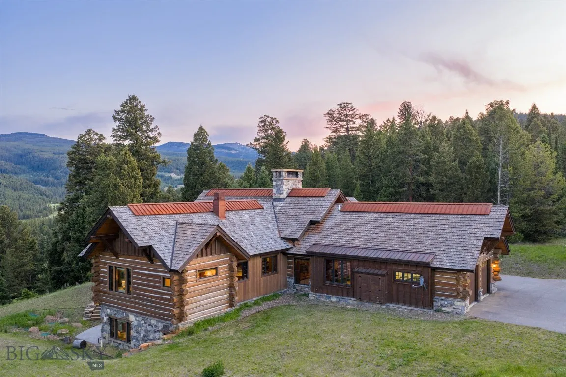 Experience the ultimate in mountain living with this beautifully crafted log home